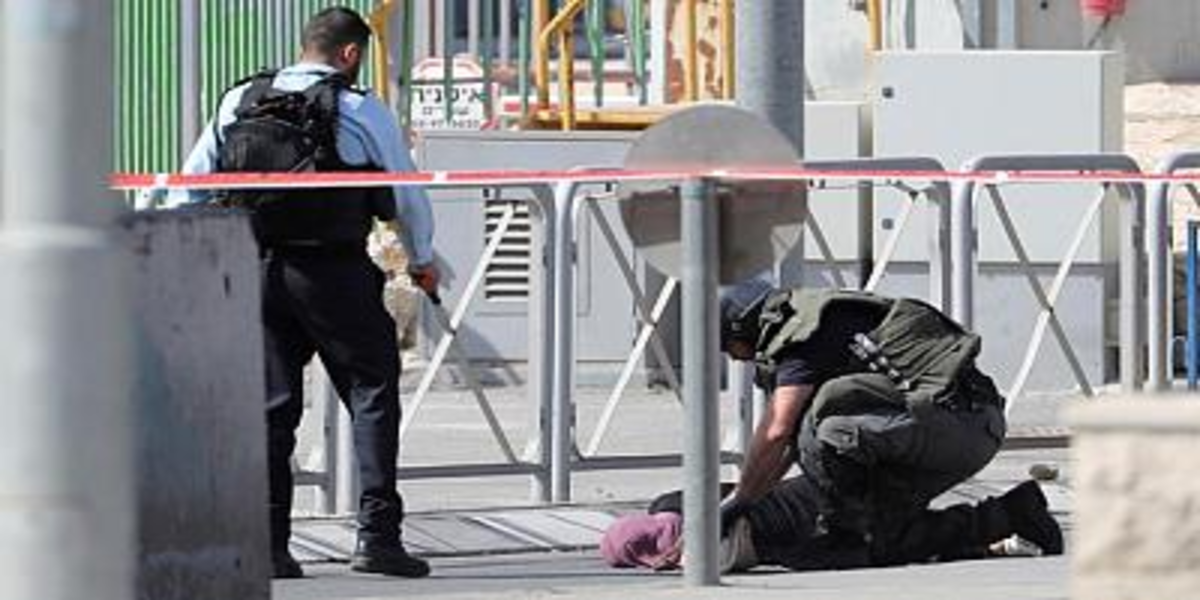 An Israeli guard shoots dead a Palestinian woman wielding a knife