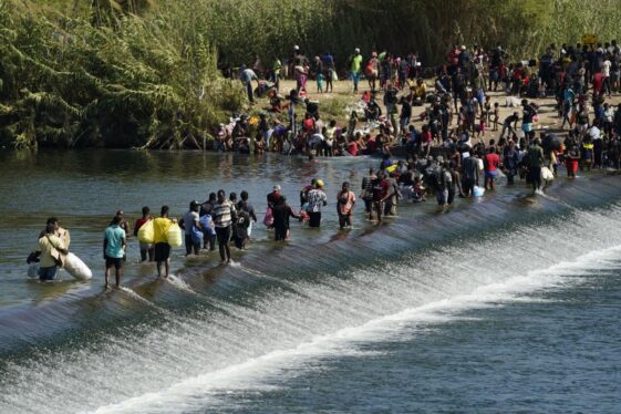 Thousands of Haitian migrants camp out under a bridge in Texas