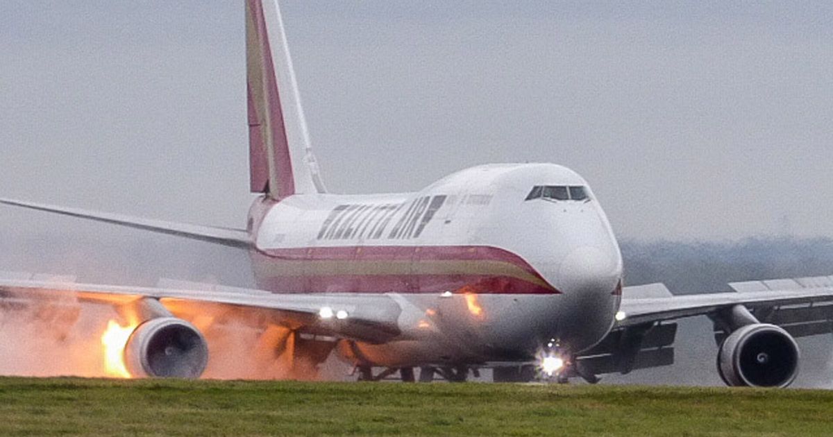 Landing plane bursts into flames at UK airport