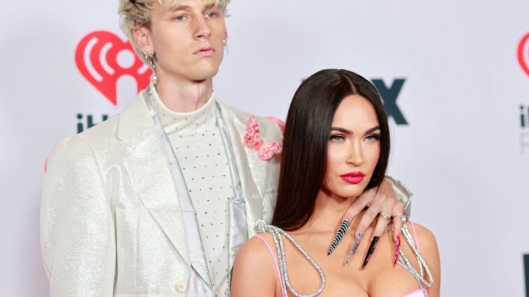 Machine Gun Kelly reveals that Megan Fox's ring is designed to hurt to take it off