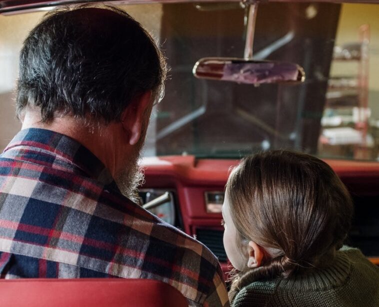 Ukrainian man and daughter cry as they say goodbye amid conflict with Russia